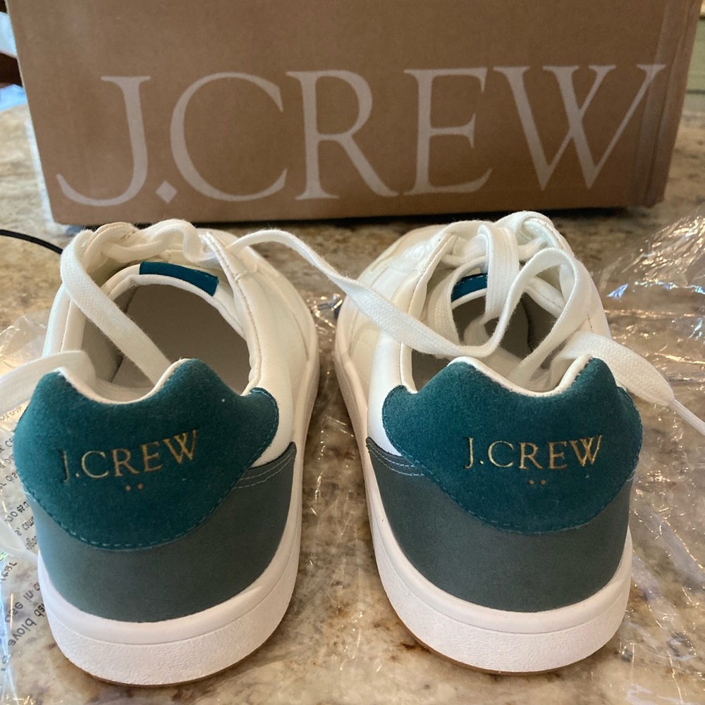 Saturday sneaker sold out online. In original packaging and jcrew box. Size 7.